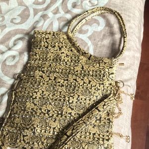 Golden Black bejeweled Rosette Handbag